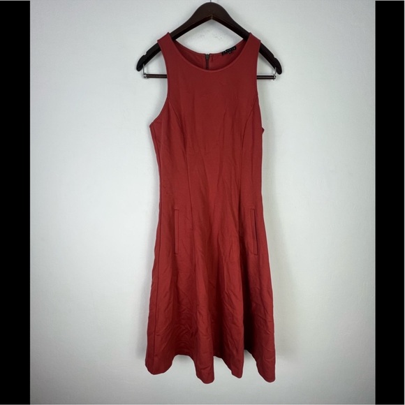 Theory Dresses & Skirts - Sleek Theory Dress Size 6 orange Dress Size 6 skater skirt style zipper back